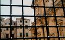 Looking out on Dubrovniks buildings from inside one of old Dubrovniks jail cells.